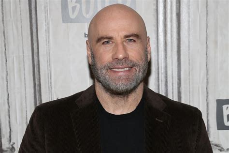 john travolta height weight|More.